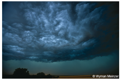 A dangerous storm casts a formidable shadow over the open rangeland of Knox County.