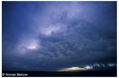 An impending storm in the rolling plains of King County.