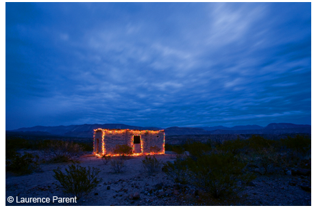 Illuminated adobe ruin in the ghost town of Pueblo Nuevo, Chinati Mountains.