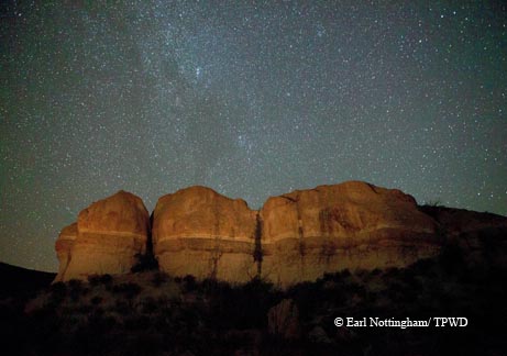 Layered rock and a clear desert sky showcase nature’s wonders in the Big Bend region of Texas.