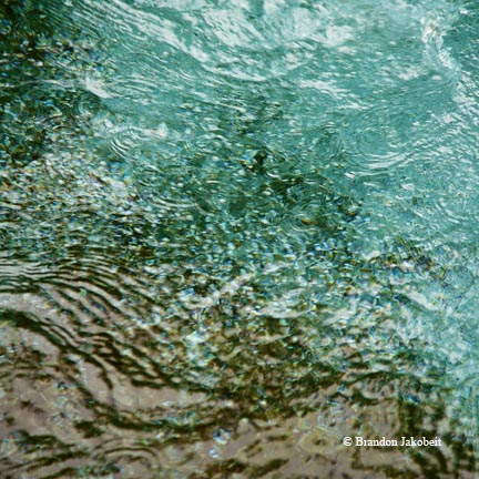 Churning water at Balmorhea State Park; shoreline at Redfish Bay near Port Aransas.