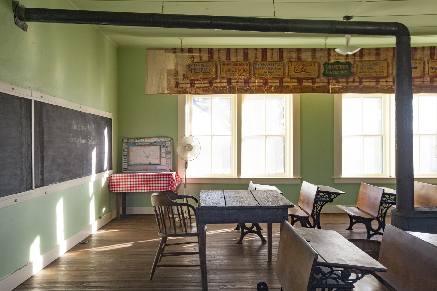 Desks inside old schoolhouse