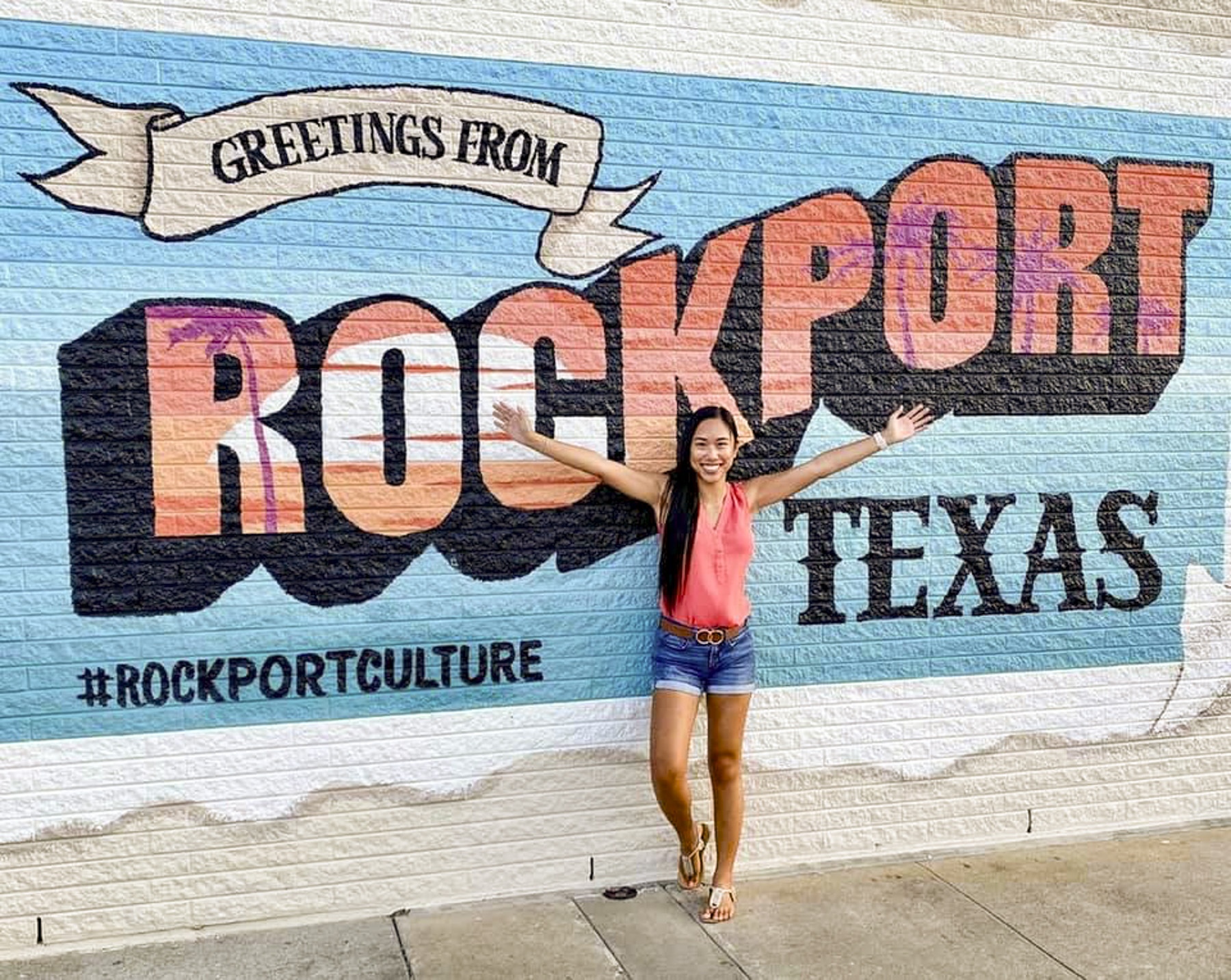 Woman standing in front of Rockport Mural