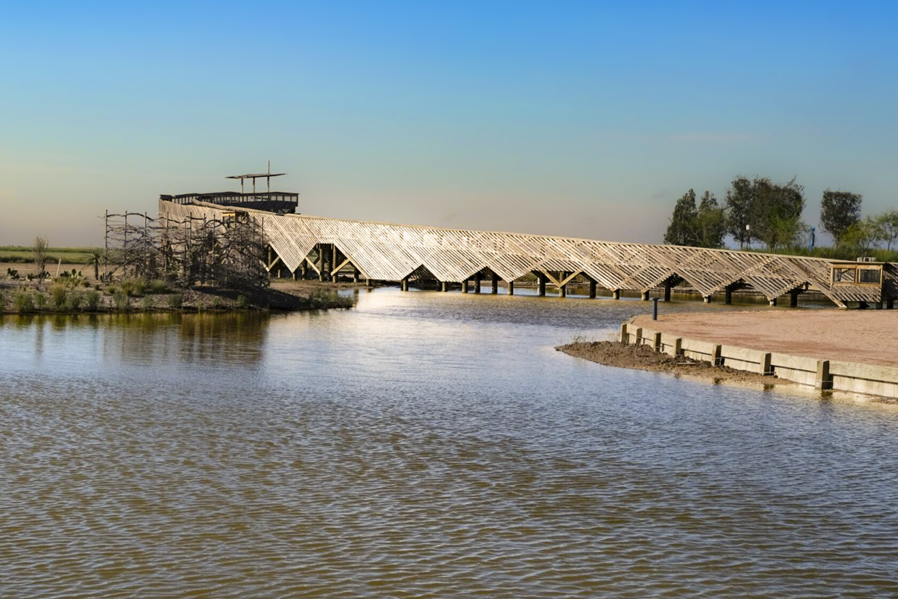 Pond and structures at South Texas Ecotourism center