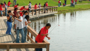 kids fishing from pier